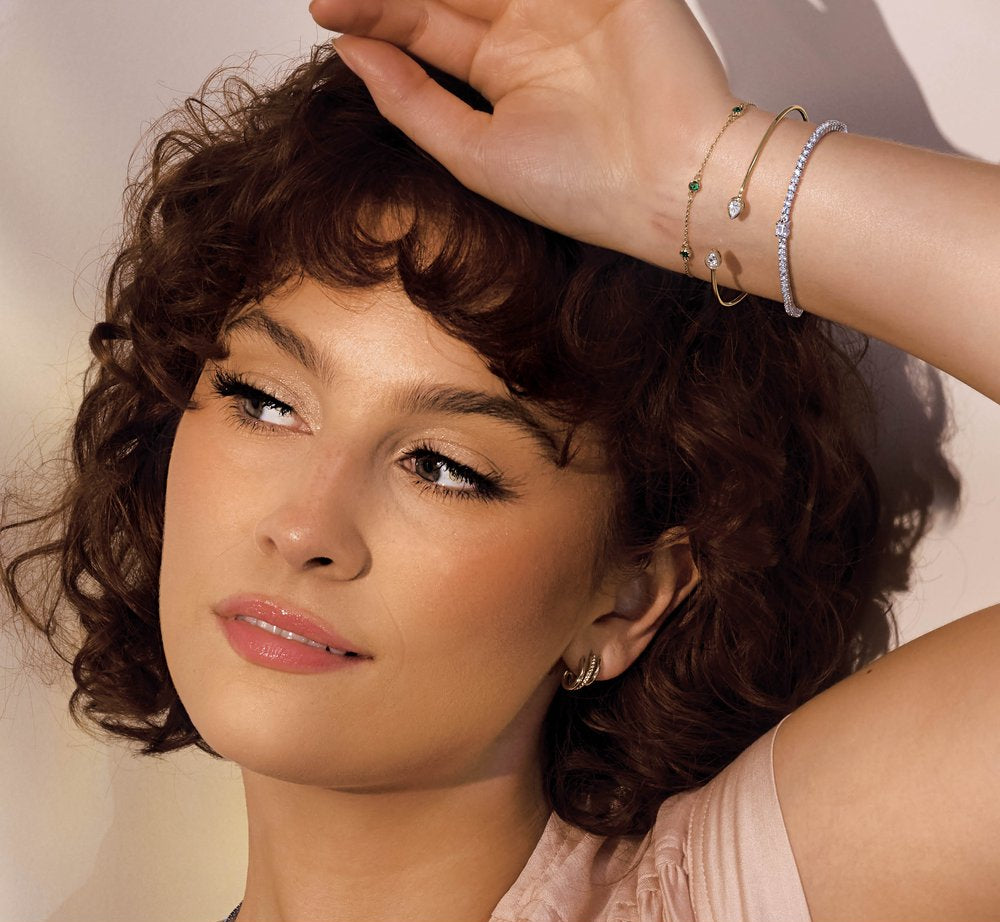 Diamond Tennis Bracelet with Emerald Center Stone